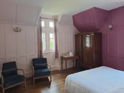 Un ou plusieurs lits dans un hébergement de l'établissement Château de la Redortière