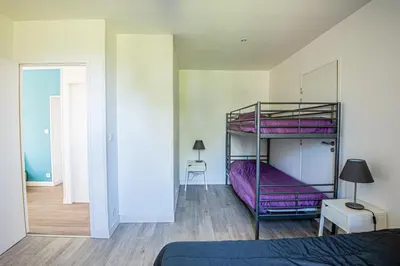 Un ou plusieurs lits dans un hébergement de l'établissement Gîte Martin pêcheur au coeur de la nature