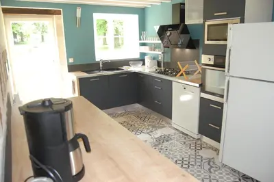 Cuisine ou kitchenette dans l'établissement Gite du chateau