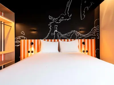 Un ou plusieurs lits dans un hébergement de l'établissement ibis Styles La Rochelle Centre les Minimes