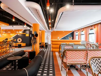 Coin salon dans l'établissement ibis Styles La Rochelle Centre les Minimes