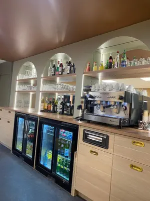 Cuisine ou kitchenette dans l'établissement Green Hôtels Poitiers