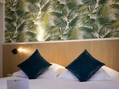 Un ou plusieurs lits dans un hébergement de l'établissement Best Western Le Bois de la Marche