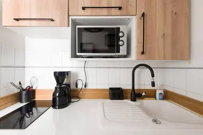Cuisine ou kitchenette dans l'établissement Le Temple de La Rochelle