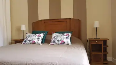 Un ou plusieurs lits dans un hébergement de l'établissement chambres d'hôtes du Tilleul