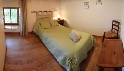 Un ou plusieurs lits dans un hébergement de l'établissement Chambres d'Hôtes Domaine Le Fragnaud