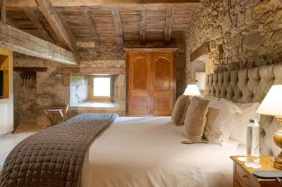 Un ou plusieurs lits dans un hébergement de l'établissement Domaine des Etangs, Auberge Collection