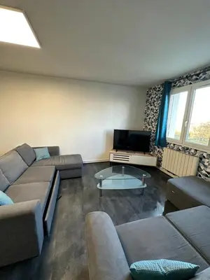 Coin salon dans l'établissement Appartement meublé proche du futuroscope