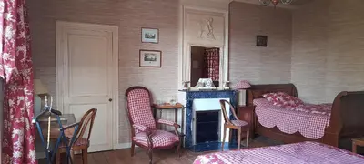 Un ou plusieurs lits dans un hébergement de l'établissement Le Clos de la Garenne Maison d'hôtes