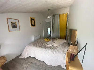 Un ou plusieurs lits dans un hébergement de l'établissement Chez Isabelle et Johann