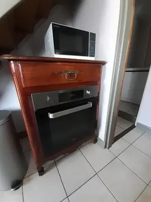 Télévision ou salle de divertissement dans l'établissement Le Figuier