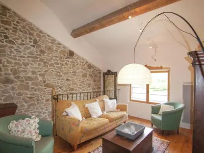 Coin salon dans l'établissement Cottage in Dordogne with Accessible Terrace