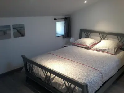 Un ou plusieurs lits dans un hébergement de l'établissement Gîte climatisé *** Le Pigeonnier
