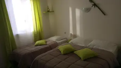 Un ou plusieurs lits dans un hébergement de l'établissement Hôtel Montespan