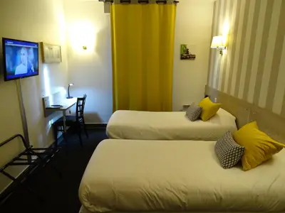 Un ou plusieurs lits dans un hébergement de l'établissement Sure Hotel by Best Western Angouleme