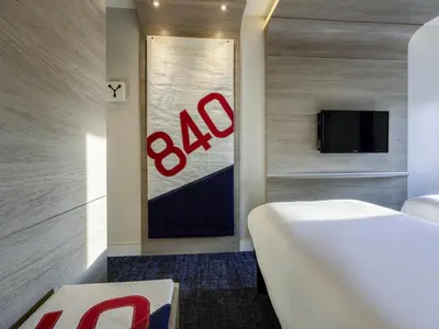 Un ou plusieurs lits dans un hébergement de l'établissement ibis Styles La Rochelle Centre Vieux Port
