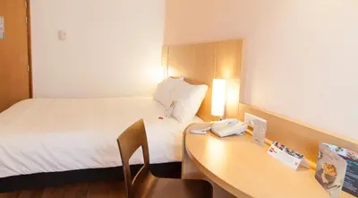 Un ou plusieurs lits dans un hébergement de l'établissement ibis Poitiers Centre
