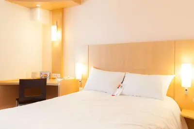 Un ou plusieurs lits dans un hébergement de l'établissement ibis Poitiers Centre