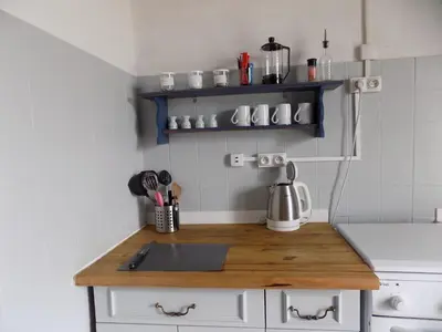 Cuisine ou kitchenette dans l'établissement La maisonnette