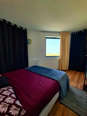 Un ou plusieurs lits dans un hébergement de l'établissement Logement entier 30m² - 800m du Futuroscope
