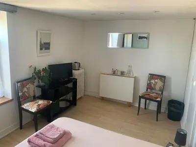 Un ou plusieurs lits dans un hébergement de l'établissement Maison de centre-ville