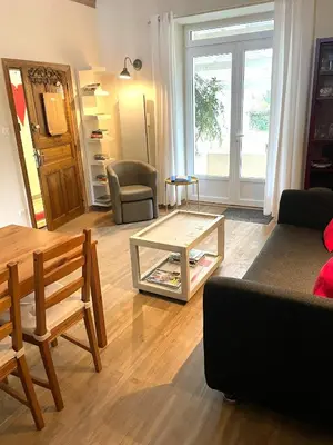 Coin salon dans l'établissement Appartement La Haute Preze & Golffrance