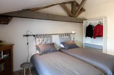 Un ou plusieurs lits dans un hébergement de l'établissement Appartement La Haute Preze & Golffrance
