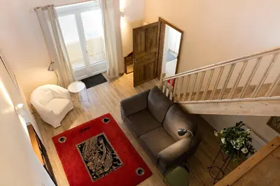 Coin salon dans l'établissement Appartement La Haute Preze & Golffrance