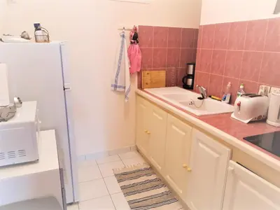 Cuisine ou kitchenette dans l'établissement Cœur de Ville