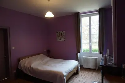 Un ou plusieurs lits dans un hébergement de l'établissement Chez Savary