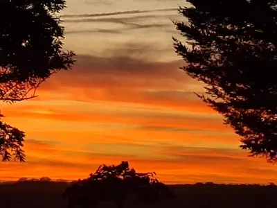 Lever ou coucher de soleil vu de le B&B/chambre d'hôtes ou à proximité