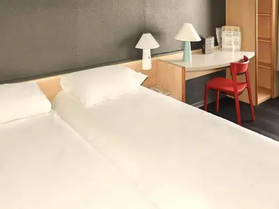 Un ou plusieurs lits dans un hébergement de l'établissement ibis Rochefort