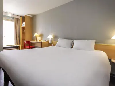 Un ou plusieurs lits dans un hébergement de l'établissement ibis Rochefort