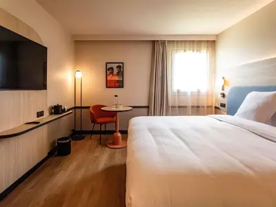 Un ou plusieurs lits dans un hébergement de l'établissement Mercure Angoulême Hôtel de France