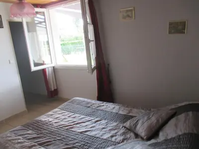 Un ou plusieurs lits dans un hébergement de l'établissement Chambre d'Hôtes Les Ormeaux