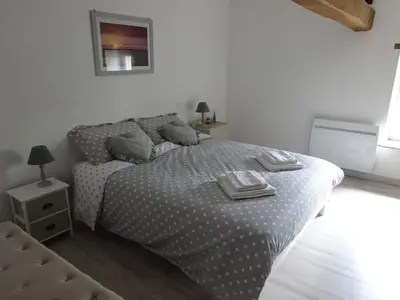 Un ou plusieurs lits dans un hébergement de l'établissement Le Cottage de Paul et Angéline