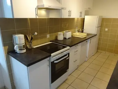 Cuisine ou kitchenette dans l'établissement Le Cottage de Paul et Angéline