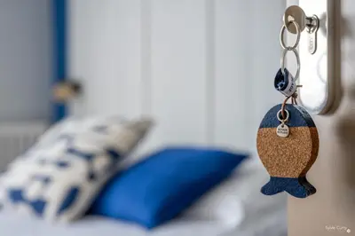 Un ou plusieurs lits dans un hébergement de l'établissement Hotel La Roseraie