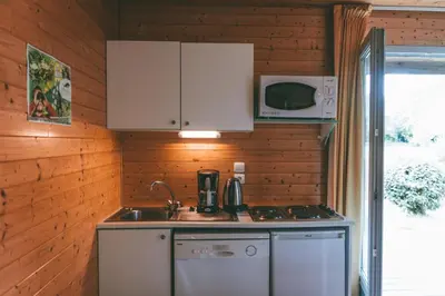 Cuisine ou kitchenette dans l'établissement Terres de France - Natura Resort Pescalis