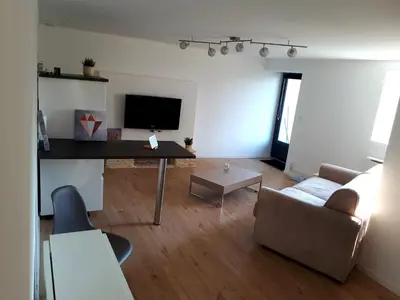 Télévision ou salle de divertissement dans l'établissement Futuroscope appartement 40m2 à 7 min du parc