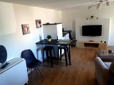 Télévision ou salle de divertissement dans l'établissement Futuroscope appartement 40m2 à 7 min du parc