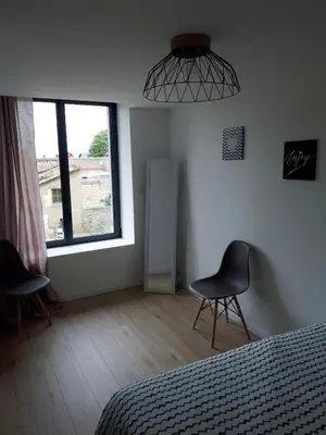 Un ou plusieurs lits dans un hébergement de l'établissement Futuroscope appartement 40m2 à 7 min du parc