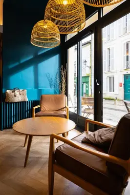 Coin salon dans l'établissement Hotel de La Paix