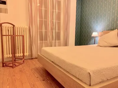 Un ou plusieurs lits dans un hébergement de l'établissement Maison de campagne Chez Trabou et Loulou 20 min de La Rochelle