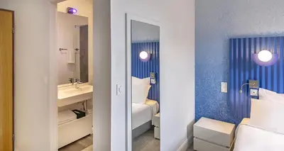 Salle de bains dans l'établissement Best Western Plus Poitiers Centre Le Grand Hotel