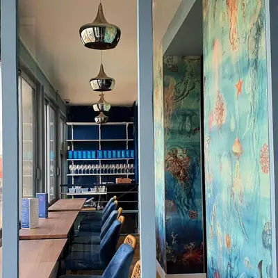 Coin salon dans l'établissement Hôtel Restaurant L'Atelier des Cousins