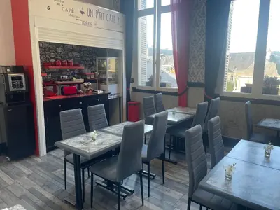 Cuisine ou kitchenette dans l'établissement Hotel Au Chapon Fin