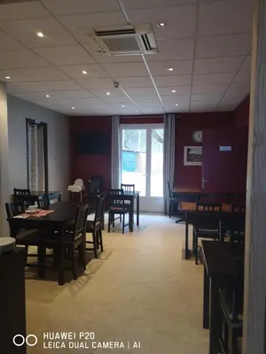 Restaurant ou autre lieu de restauration dans l'établissement Hôtel Le Memphis