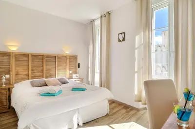 Un ou plusieurs lits dans un hébergement de l'établissement Grand Hôtel des Bains SPA