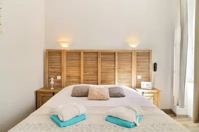 Un ou plusieurs lits dans un hébergement de l'établissement Grand Hôtel des Bains SPA